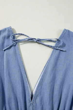 Light wash denim maxi dress with plunge back and tie detail