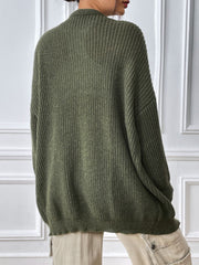 Olive green ribbed knit cardigan with balloon sleeves and a relaxed fit.