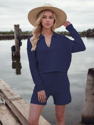 Textured knit polo sweater and shorts set in dark blue, featuring a V-neck and long sleeves.