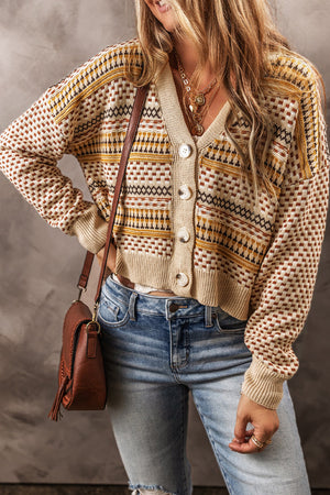Geometric knit cropped cardigan in khaki with button front and V-neck.