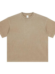 Oversized washed cotton crewneck t-shirt in beige with a relaxed fit and crew neckline.