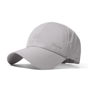 Grey perforated baseball cap with curved brim and logo detail