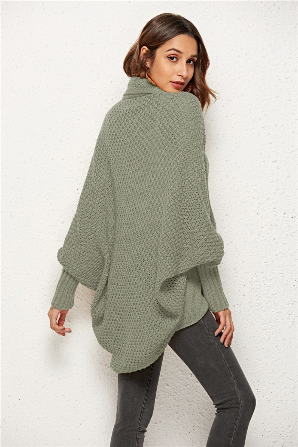 Sage cocoon knit cardigan with shawl collar and batwing sleeves.
