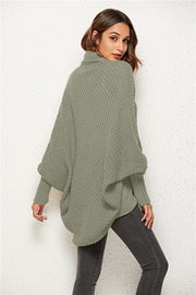 Sage cocoon knit cardigan with shawl collar and batwing sleeves.