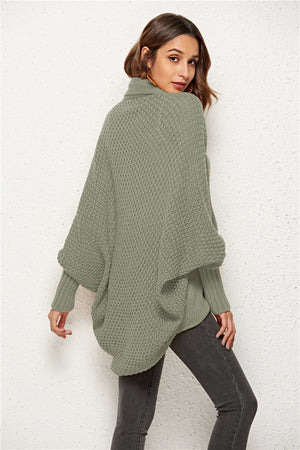 Sage cocoon knit cardigan with shawl collar and batwing sleeves.
