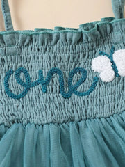 Sea blue smocked baby bodysuit with embroidered "one" and butterfly detail