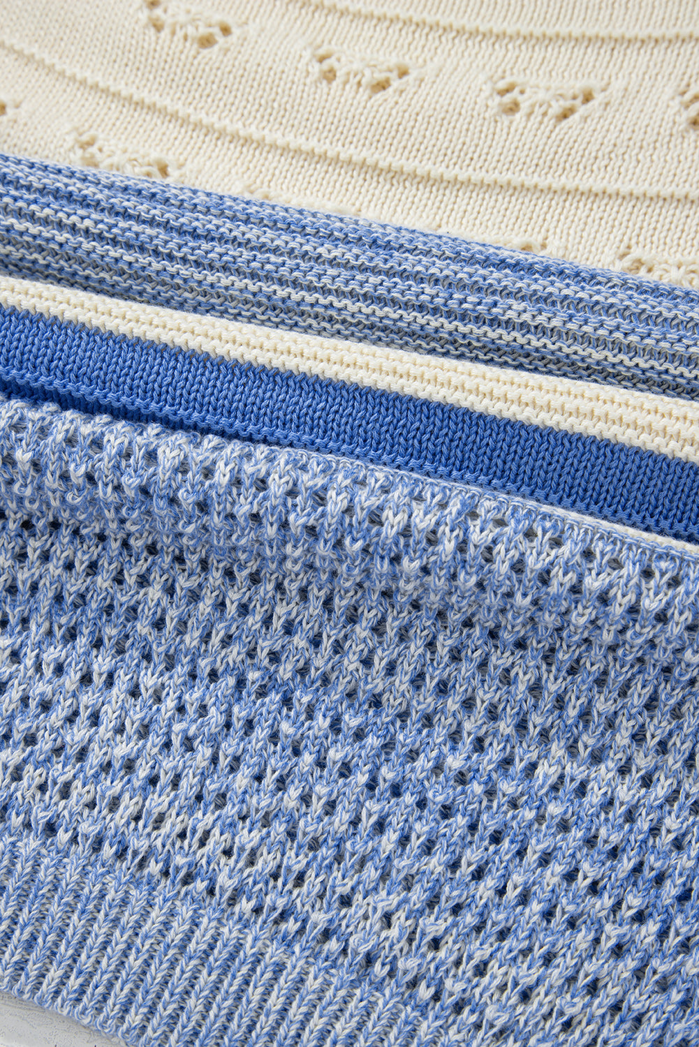 Light blue striped knit sweater with eyelet yoke detail