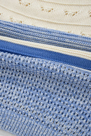Light blue striped knit sweater with eyelet yoke detail