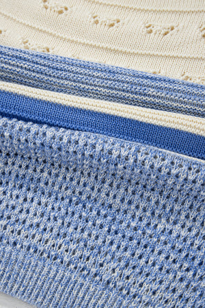 Light blue striped knit sweater with eyelet yoke detail