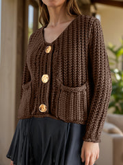 Brown chunky knit cardigan with statement buttons and front pockets