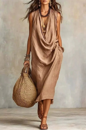 Tan cowl neck midi dress with pockets and a draped neckline.