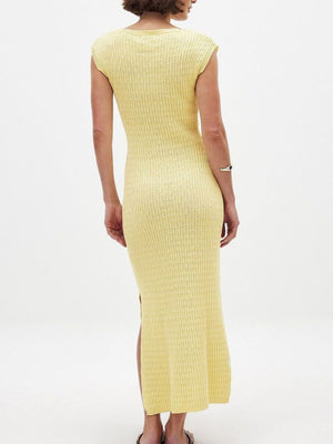 Yellow knit midi dress with scoop neck, cap sleeves, and side slit