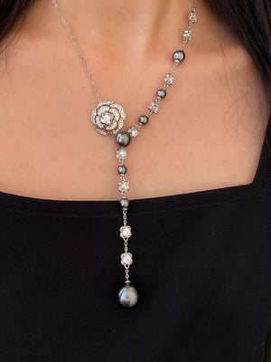 Gray pearl flower Y-necklace with clear crystal accents on a silver chain.