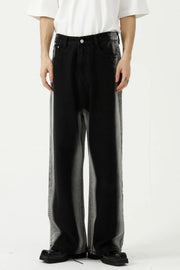 Faded side panel wide leg jeans in dark wash denim with a relaxed fit.