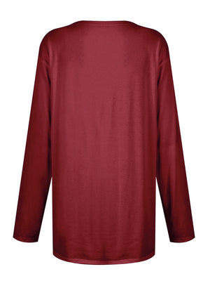 Burgundy relaxed fit tunic with long sleeves and a crew neck, showing the back view.
