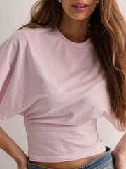 Blush pink t-shirt with batwing sleeves and a fitted waist