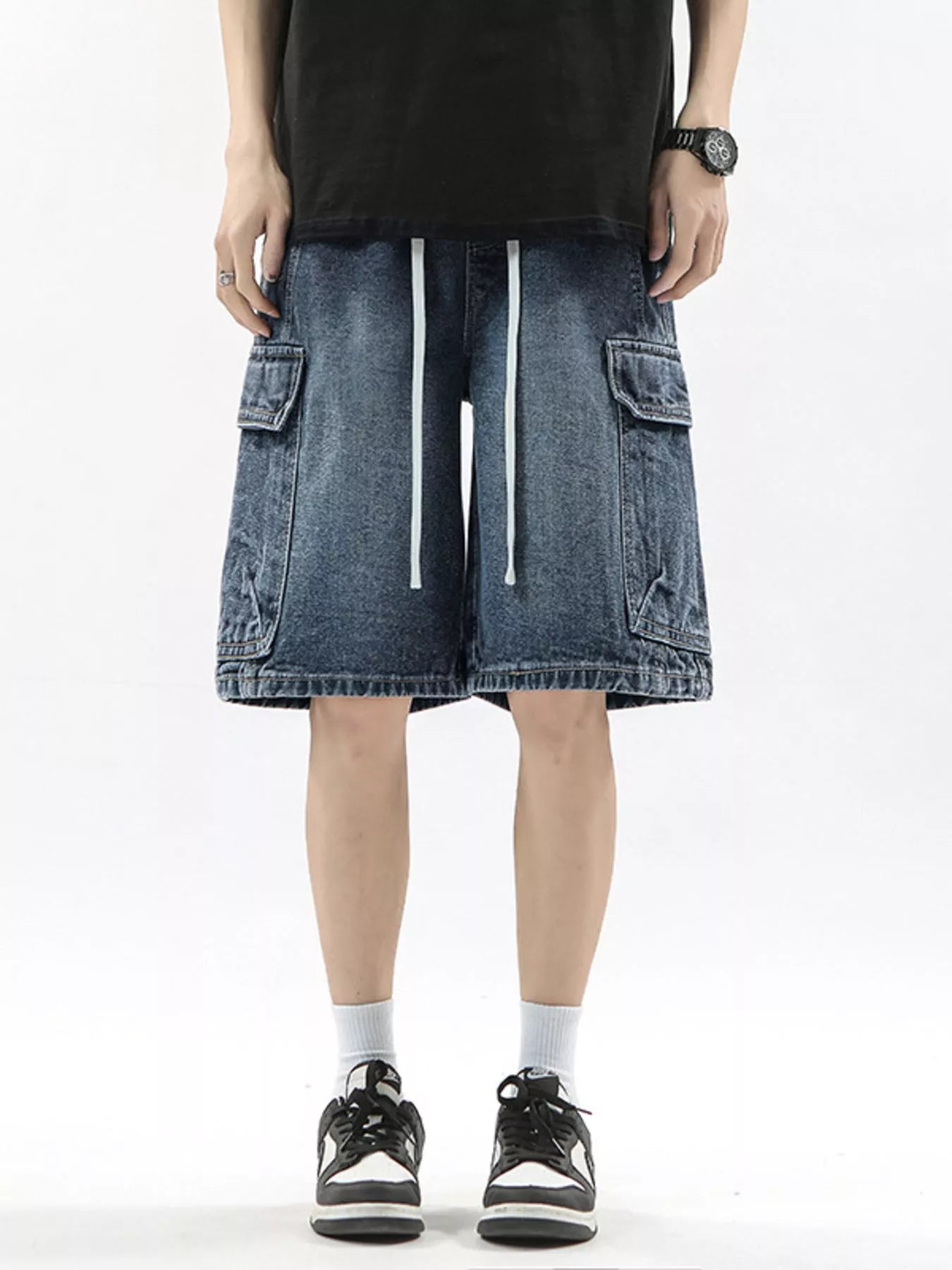 Men's denim cargo shorts in Vintage Blue with drawstring waist and multiple pockets.