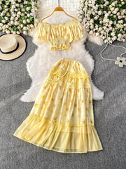 Yellow floral ruffled off-shoulder crop top and tiered midi skirt set with lace trim.