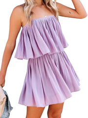 Lilac cami romper with delicate straps and tiered pleated skirt.