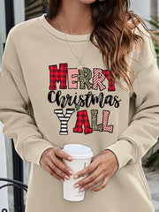Beige oversized sweatshirt with Merry Christmas Y'all graphic in plaid, leopard and striped patterns.
