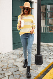 Yellow and cream striped oversized knit sweater with crew neck and balloon sleeves.