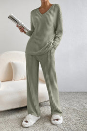 Sage ribbed knit lounge set with v-neck sweater and wide-leg pants.