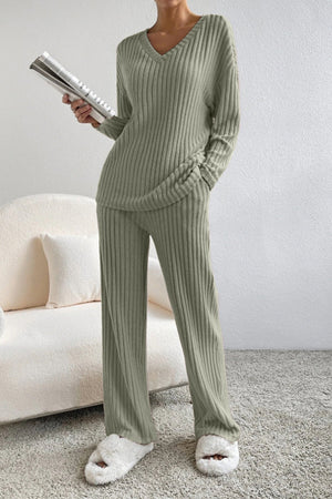 Sage ribbed knit lounge set with v-neck sweater and wide-leg pants.
