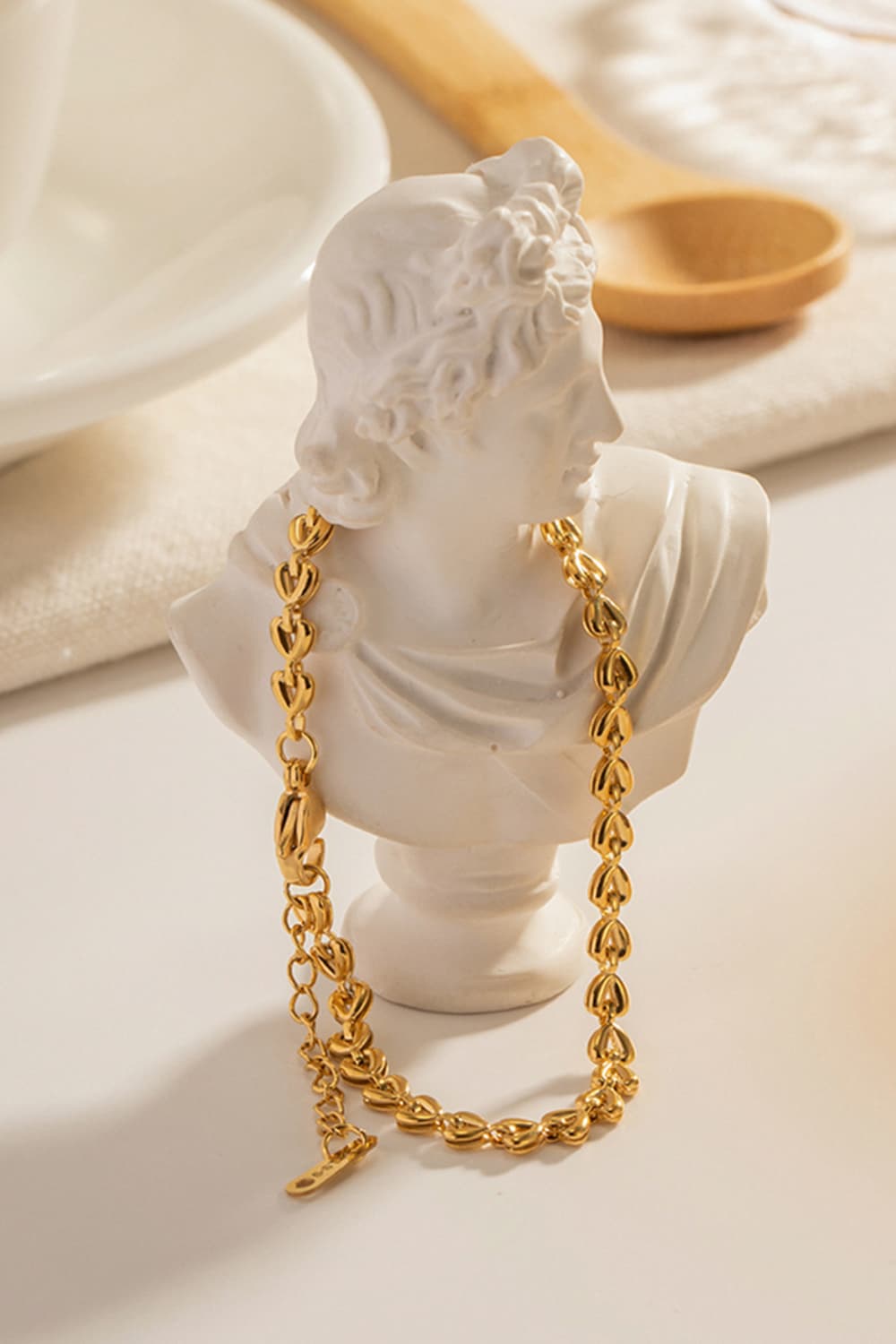Gold linked heartbeat chain bracelet with adjustable clasp