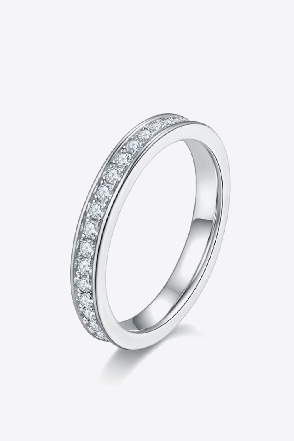 Silver moissanite eternity band ring with pavé set stones