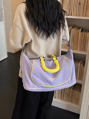 Premium Oxford Cloth Duffle Bag in purple with yellow trim and handles.