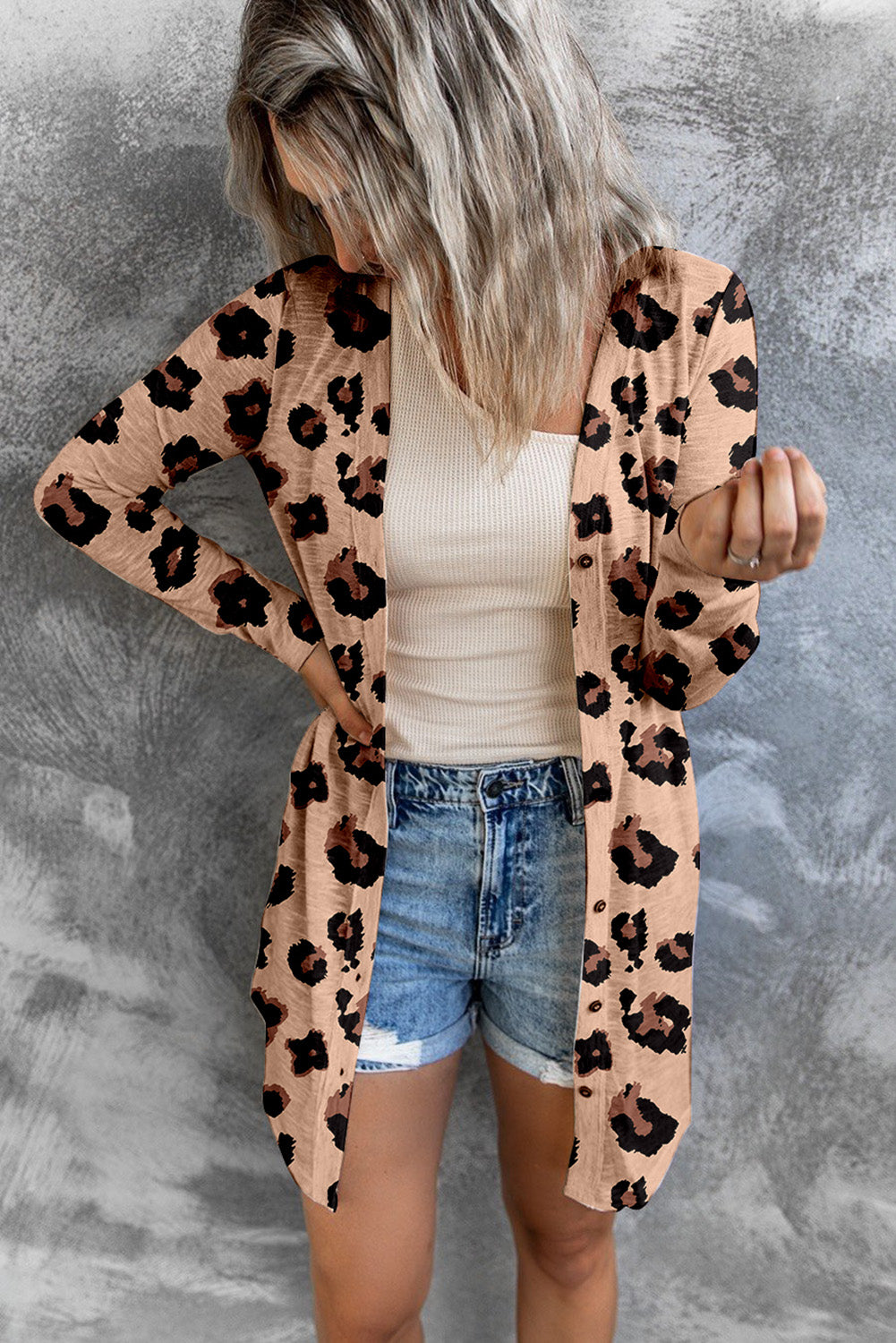 Tan leopard print open-front duster cardigan with buttons.