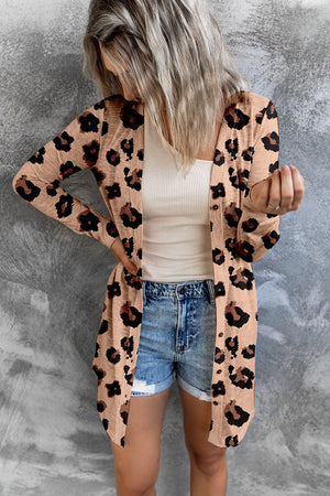 Tan leopard print open-front duster cardigan with buttons.