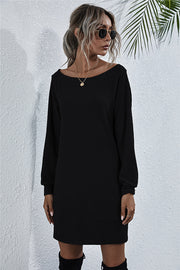Black waffle knit mini dress with off-shoulder boat neck and long sleeves