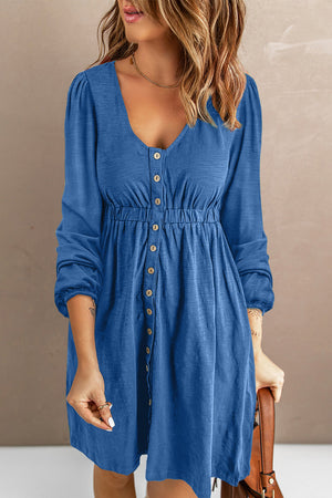 Blue button-down empire waist mini dress with V-neck and long sleeves