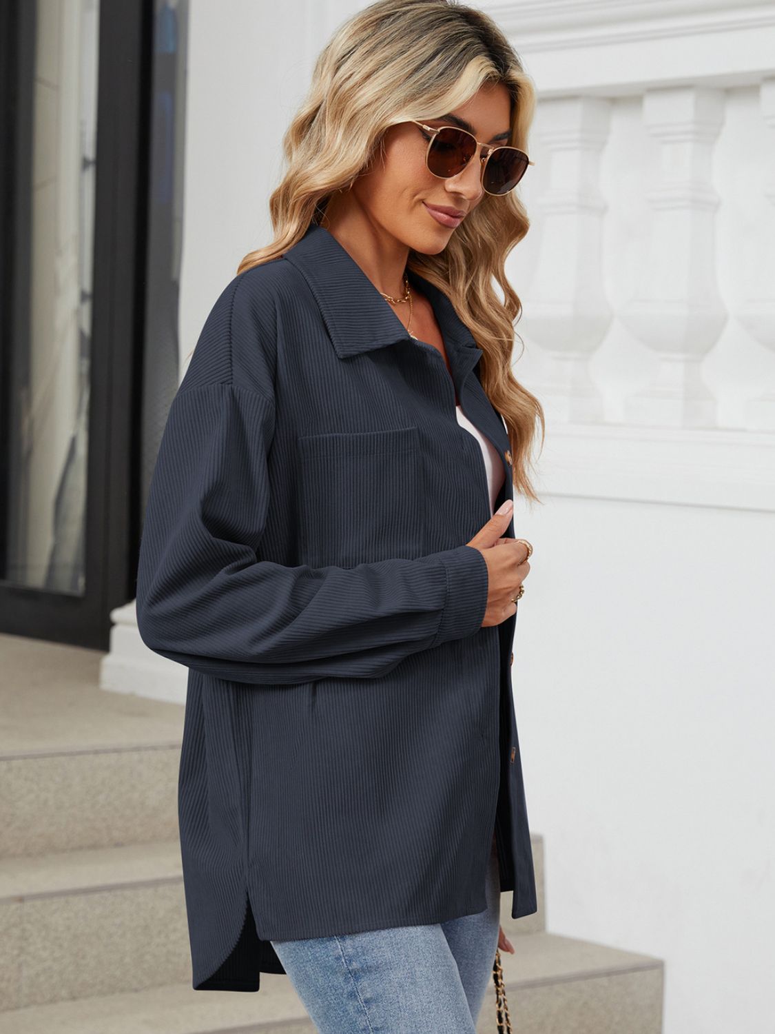 Dark Navy corduroy overshirt with patch pockets and buttoned front.
