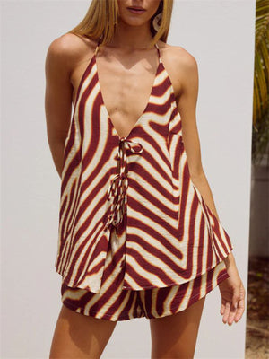 Backless halter neck two-piece set with deep V-neck and tie front in a zebra print.