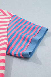 Short sleeve tee with pink and white stripes on the body and pink and blue stripes on the sleeves.