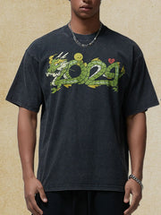 Black washed cotton tee with a green dragon graphic and a small yellow character.