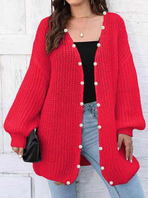 Scarlet balloon sleeve cardigan with pearl buttons and open knit detail.