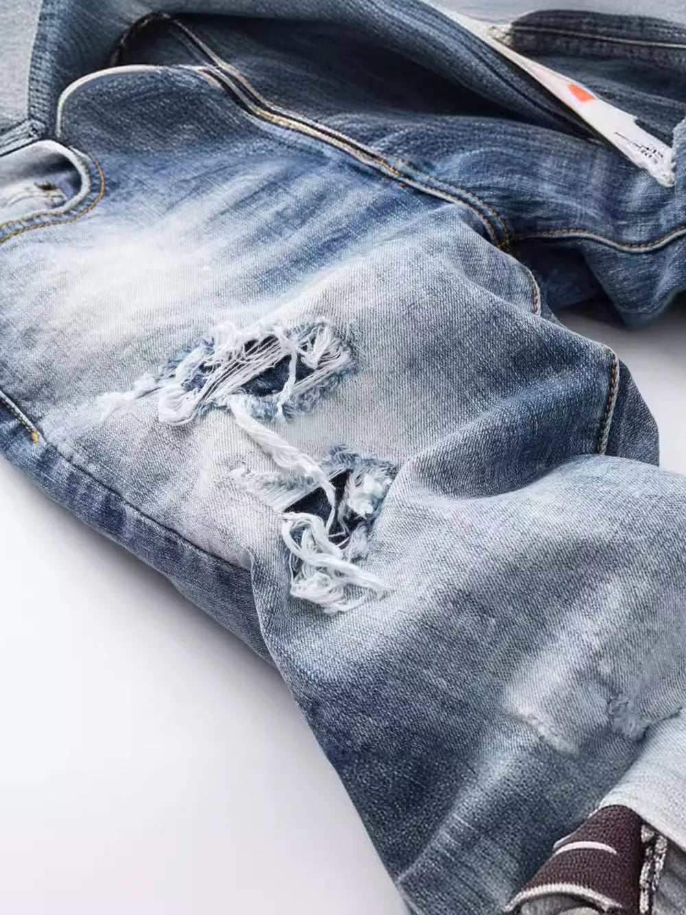 Men S Distressed Slim Fit Jeans in Medium, close-up detail