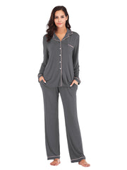 Charcoal pajama set with piped trim and pockets.