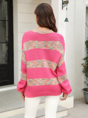 Rainbow stripe slouchy knit sweater in acrylic with crew neck and long sleeves.