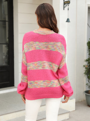 Rainbow stripe slouchy knit sweater in acrylic with crew neck and long sleeves.