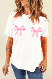 White t-shirt with double pink watercolor bow graphic, crew neck, short sleeves.