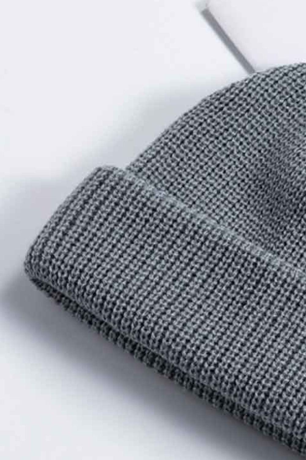 Gray ribbed knit beanie with a turn-up cuff