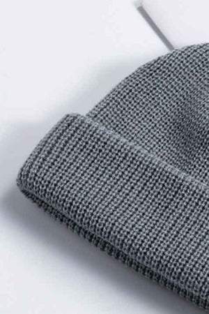 Gray ribbed knit beanie with a turn-up cuff
