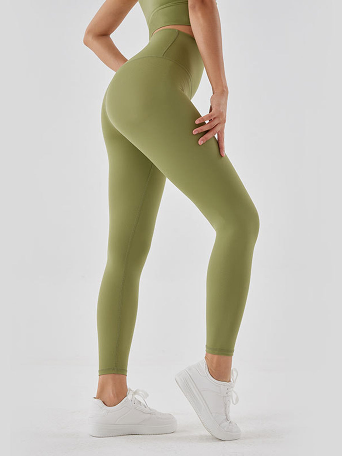 Matcha green high-waist leggings with a seamless contour design.