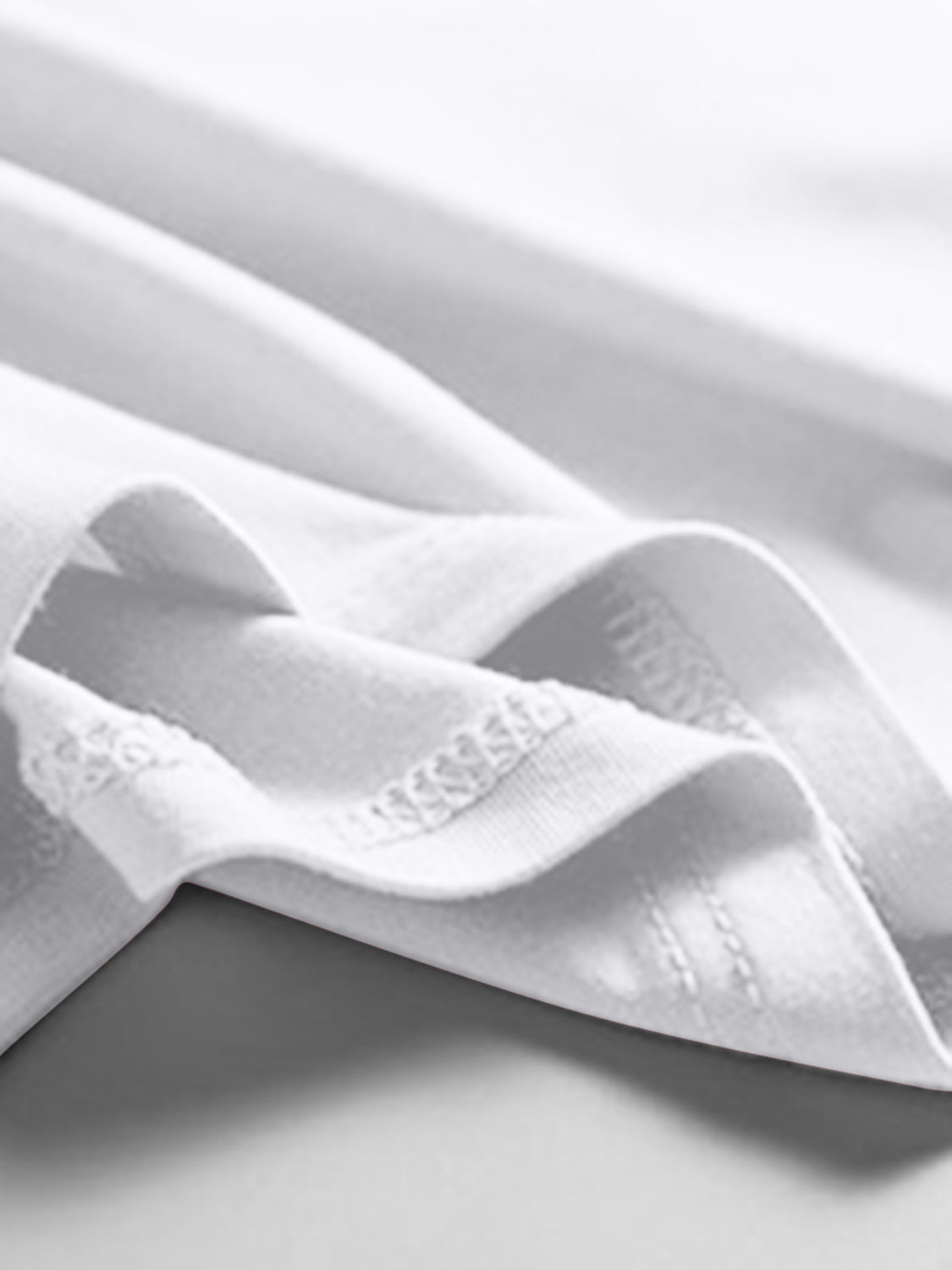White scoop neck tank top with visible stitching detail