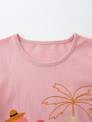 Pink cotton baby tee with flamingo and palm tree graphic.