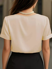 Apricot satin shirt with cuffed sleeves and V-neck, shown from the back.
